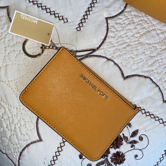 mustard yellow convertible Michael Kors backpack
